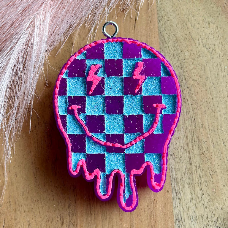 Drippy Checkered Smiley Face Freshie Design