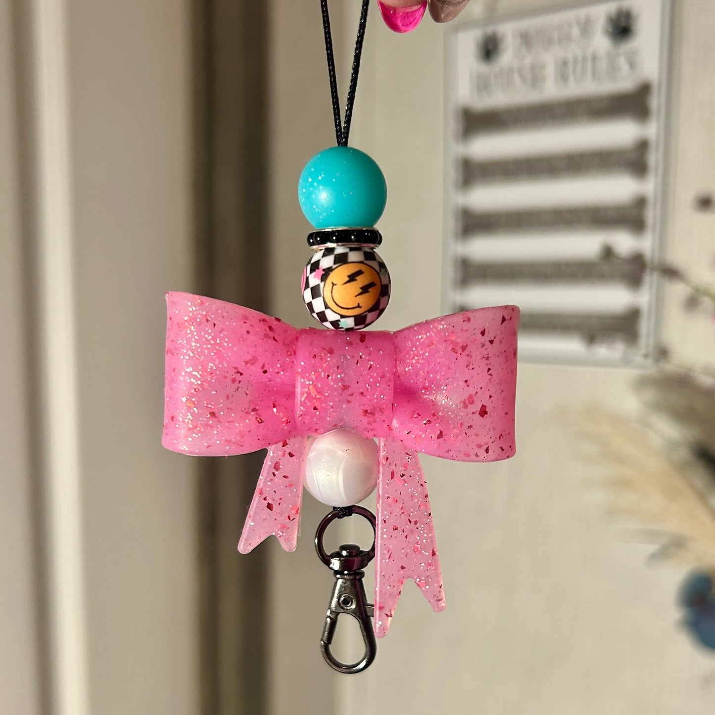 Pink Glitter Bow with Checkered Smiley accent Bead Freshie Hanger